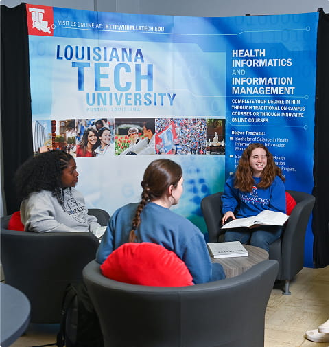 students seated on chair for discussion