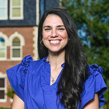 Katie Firmin outside Hale Hall