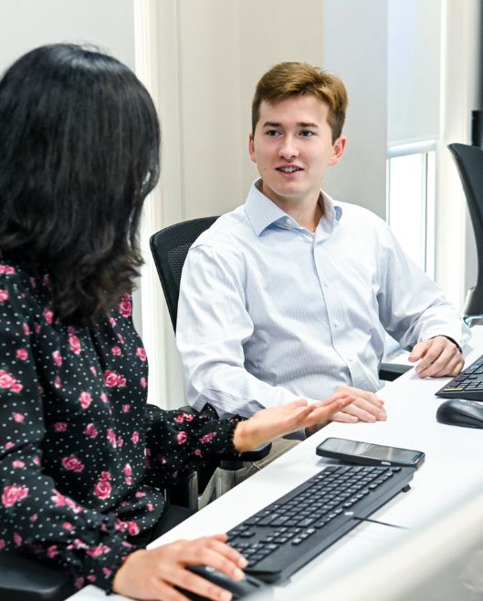 Male and female students in computer lab