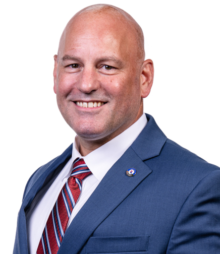 Headshot of Ryan Freling on a white background