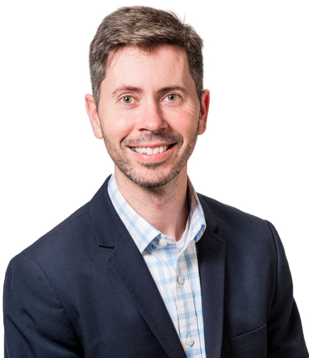 Headshot of Greg Lyons on a white background