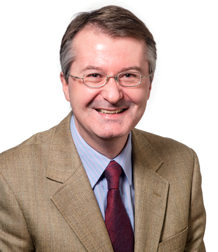 Headshot of Philip McMullan on a white background