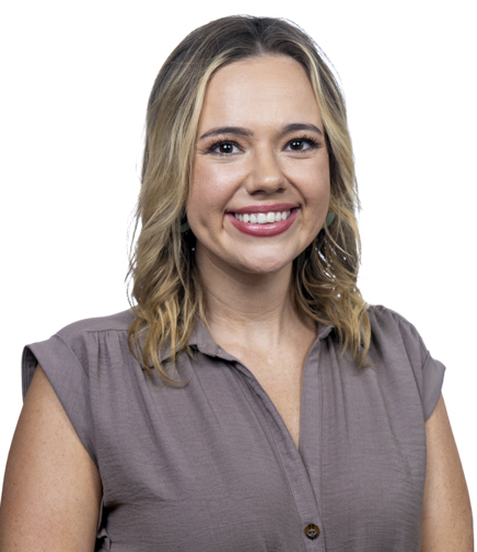 Headshot of Taylor Nealy on a white background