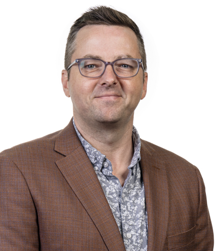 Headshot of kyle roberts on a white background