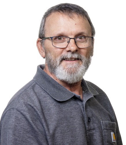 Headshot of James White on a white background