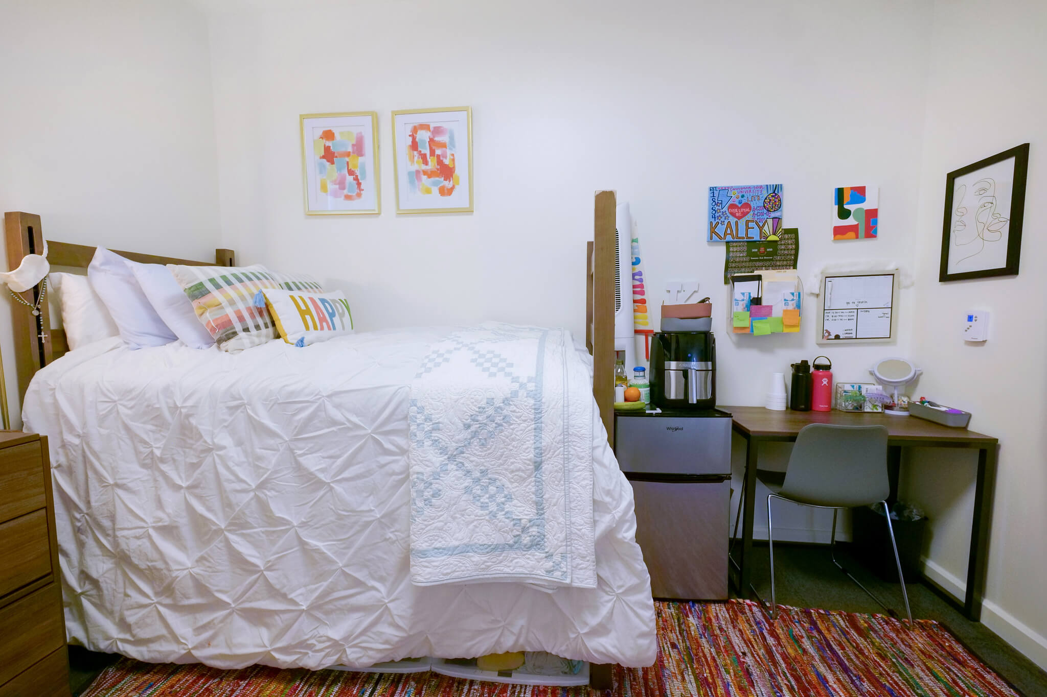 A decorated bed and desk in Mitchell Hall