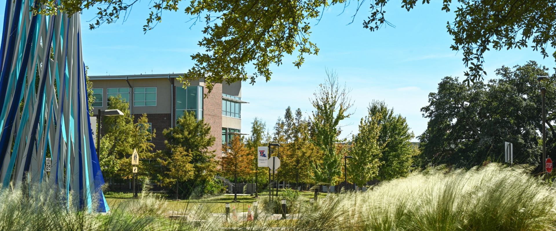 Tech Pointe, the Aspire sculpture, and bushes