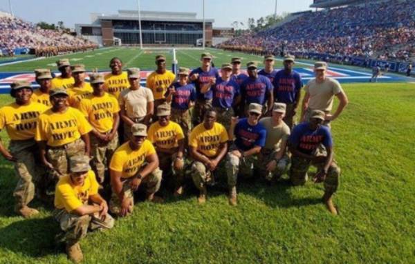 group picture of army rotc on the ground