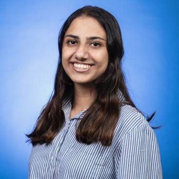 Headshot of Samrageey Lohani on a blue background