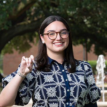 Riley Jones standing in the Quad