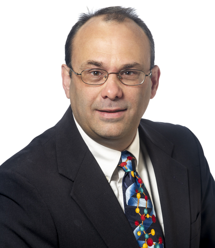 Headshot of Tom Bishop on a white background