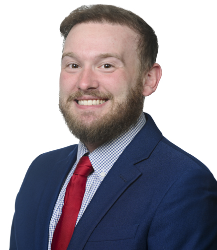 Headshot of Avery Broussard on a white background