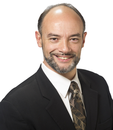 Headshot of Henry Cardenas on a white background