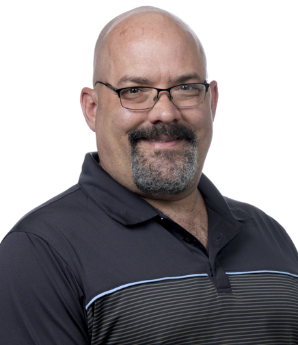 Headshot of Jon Elmore on a white background