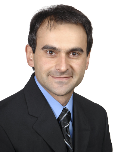 Headshot of Dentcho Genov on a white background