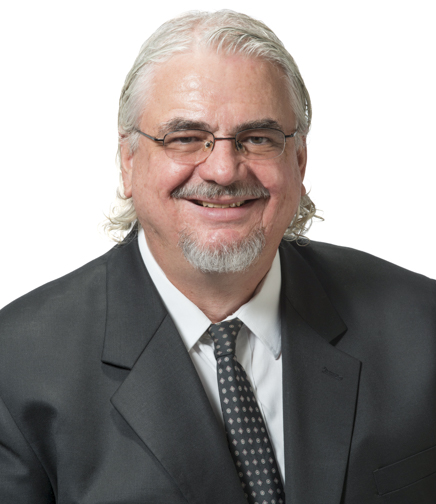 Headshot of Ron Gill on a white background