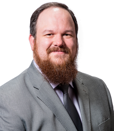 Headshot of Matthew Hartmann on a white background