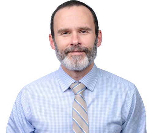 Headshot of Jeremy Mhire on a White Background