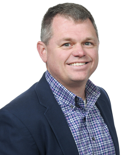 Headshot of Matthew Young on a White Background