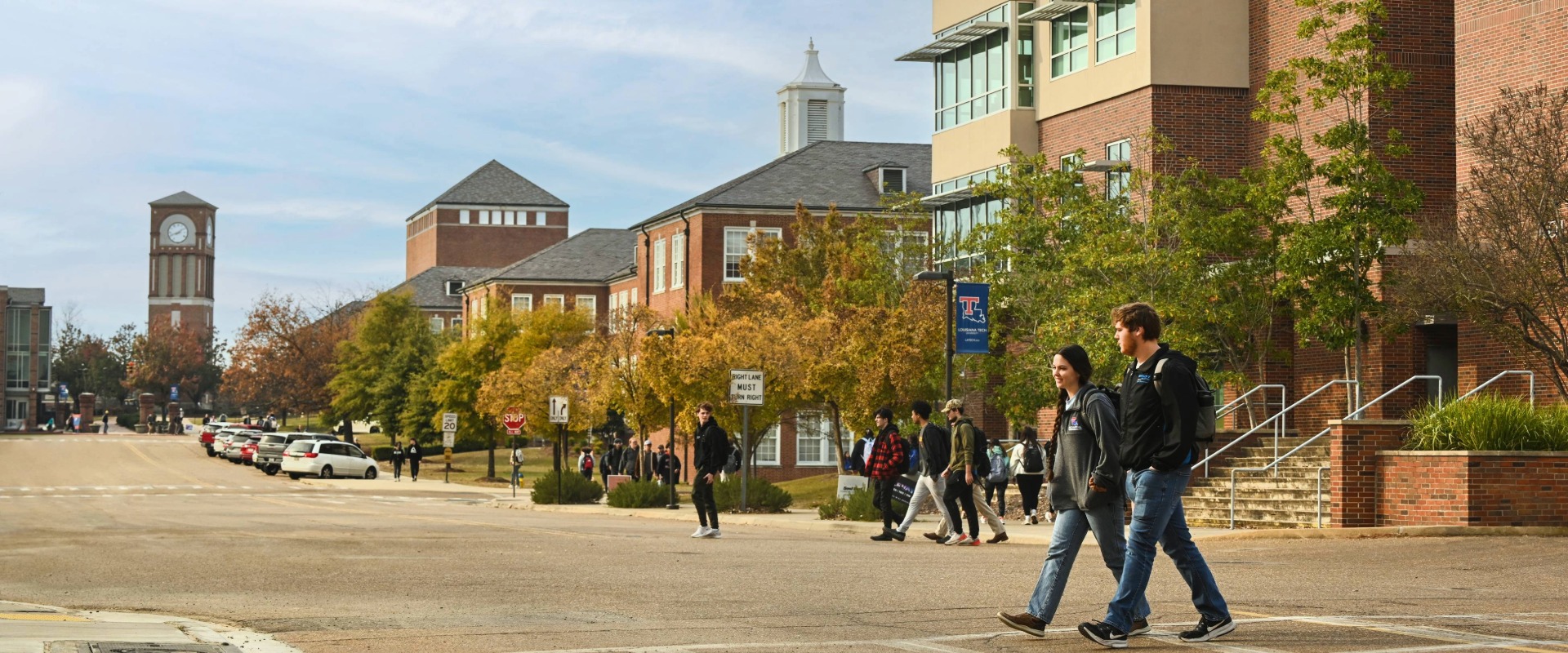 Two students walking in front of Tech Pointe
