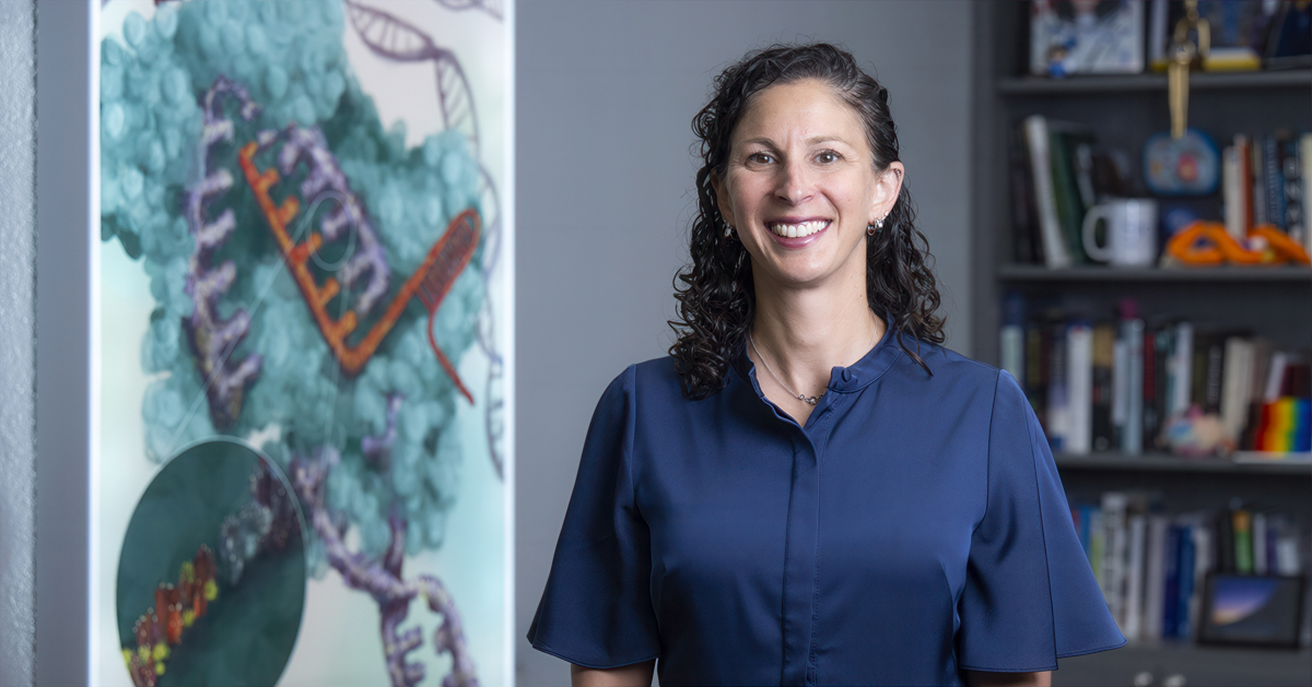 A headshot portrait of Dr. Jamie Newman in her office